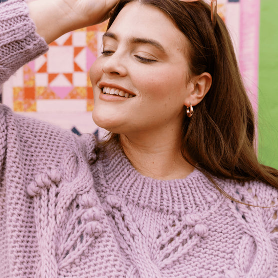 Apotheosis - Trui met Kabels en Bolletjes
7