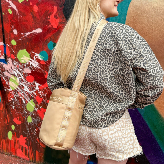 Cilinder schoudertas - Hobbii
7