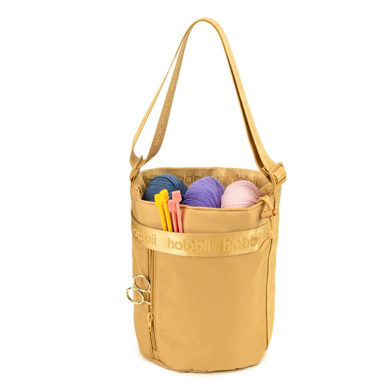 Cilinder schoudertas - Hobbii
1