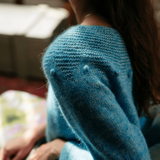 

Adorned Pullover - Trui met Ribbelsteek Pas
4