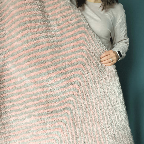 

Ruby’s Mitered Square Blanket - Deken
3