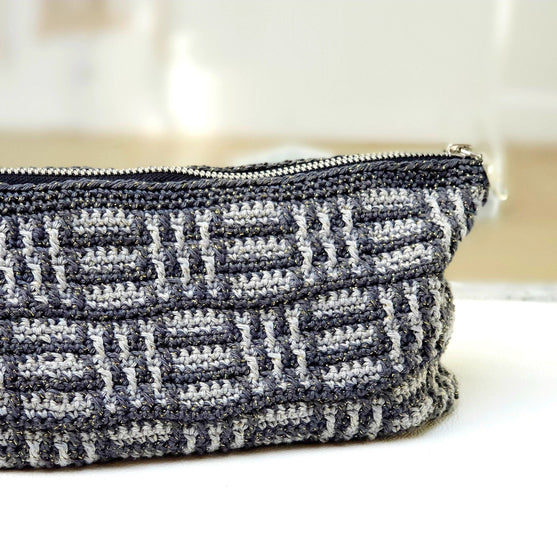 

Checker - Makeuptasje
3