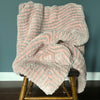 

Ruby’s Mitered Square Blanket - Deken
1
