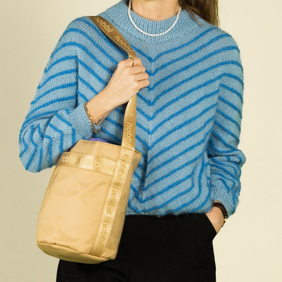 

Cilinder schoudertas - Hobbii
9