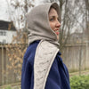 

Windswept - Sjaal met muts
2