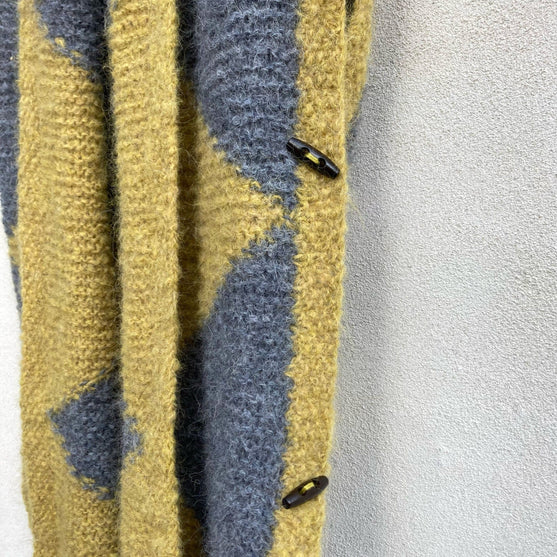 

Fringy - Omslagsjaal
7