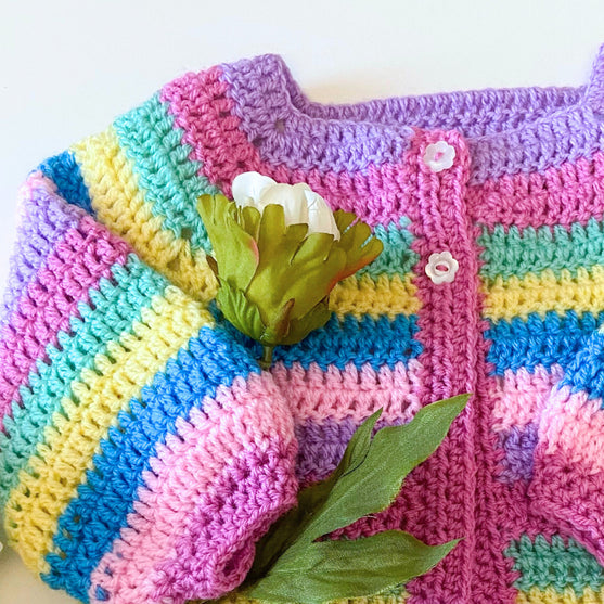 

Sunshine and Rainbows - Baby Vest
4